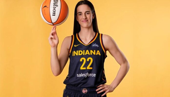 Caitlin Clark wearing her basketball Jersey and holding a basketball