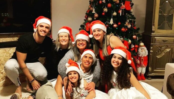 Matheus Nunes with his mother Catia and four sibling brother and sisters.