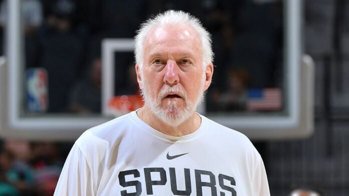 Gregg Popovich wearing his Spurs Jersey